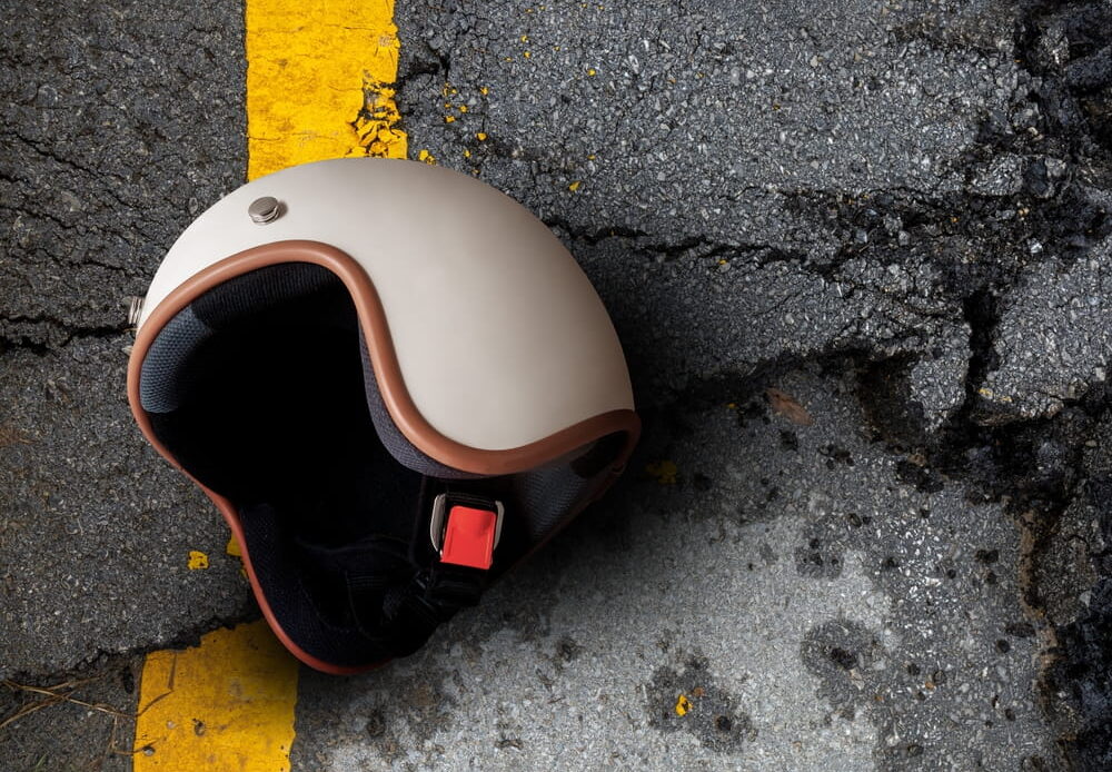Motorcycle helmet lying on the roadway after an accident