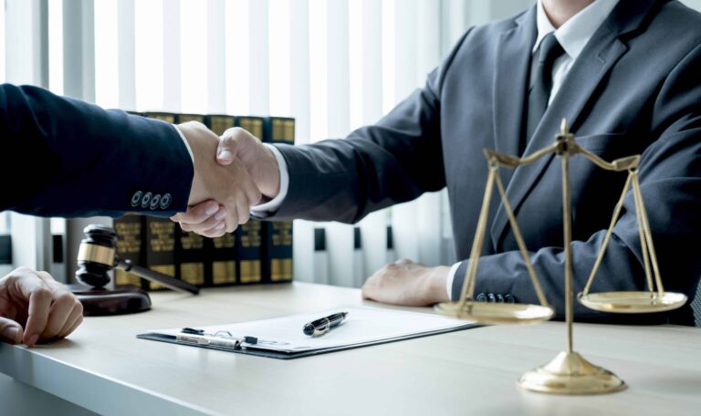 Lawyer shaking hands with a client