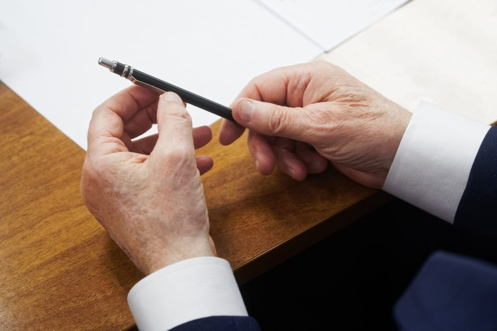 Attorney reviewing case details during personal injury settlement consultation