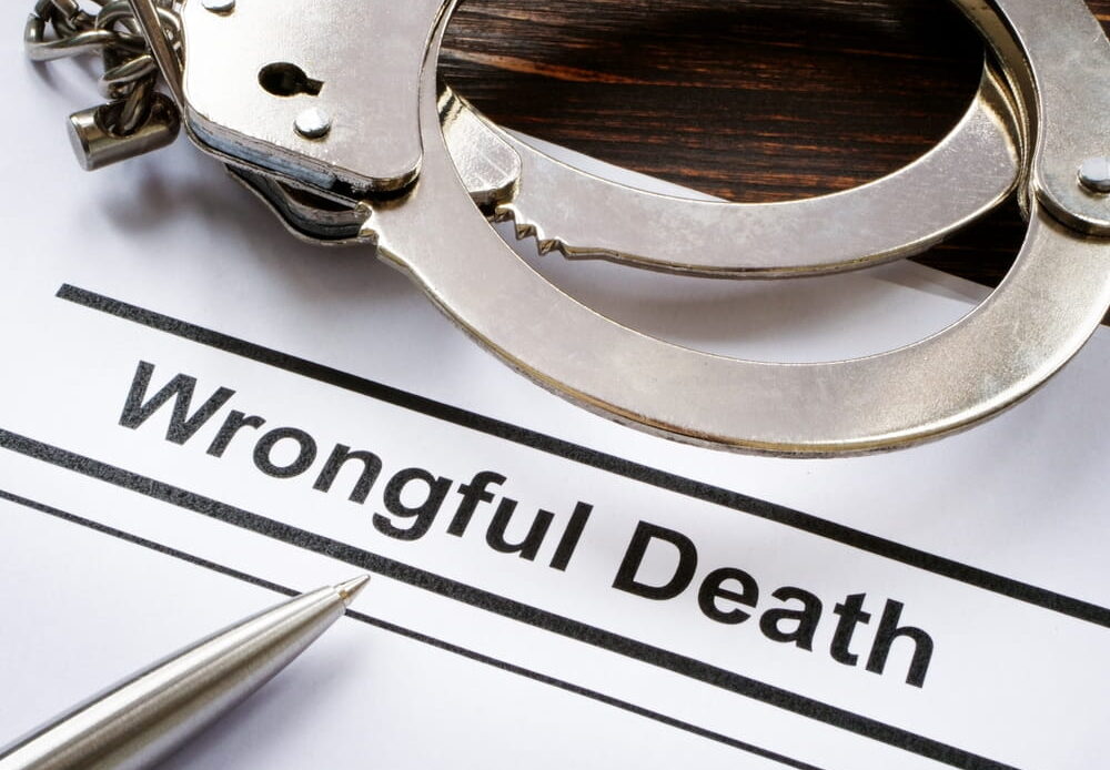 Image depicting a gavel and legal documents, symbolizing a wrongful death lawsuit in a courtroom setting.