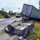 Detached trailer after truck accident showing complex insurance claims in Austin crash