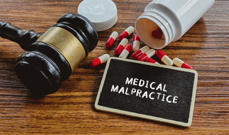Gavel and prescription pills representing medical negligence and malpractice claims in Texas