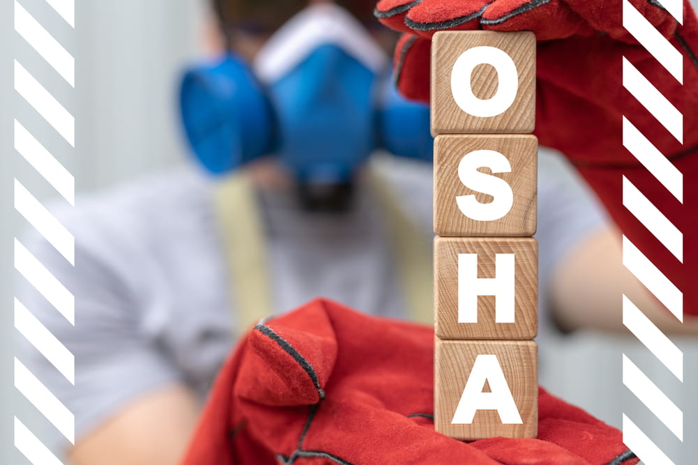 OSHA concept with safety gear and blocks spelling OSHA, representing workplace safety violations in construction environments