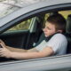 Distracted driver using a phone while driving, a common factor in rideshare accident disputes