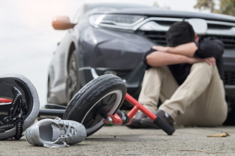 Bicycle, helmet, and shoe at the scene of a fatal accident in Colorado