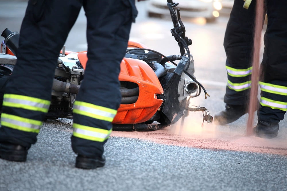 Emergency responders at the scene of a Colorado motorcycle crash