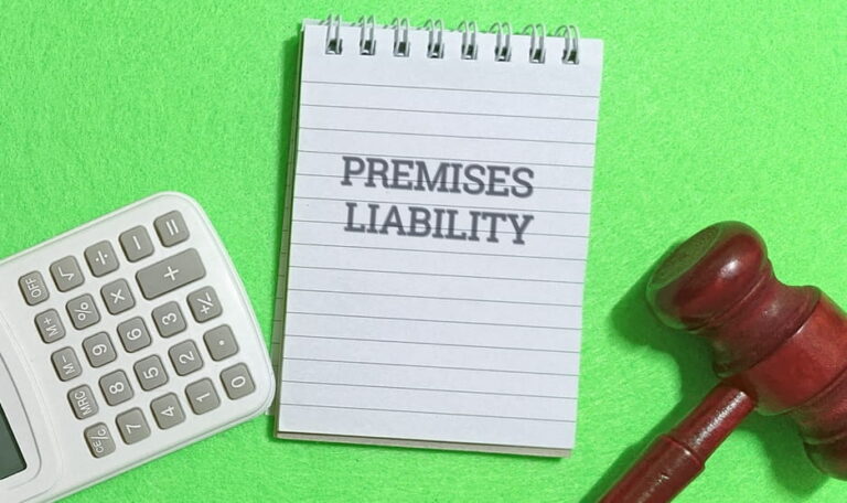 Premises liability legal concept with gavel and notes about property owner responsibilities