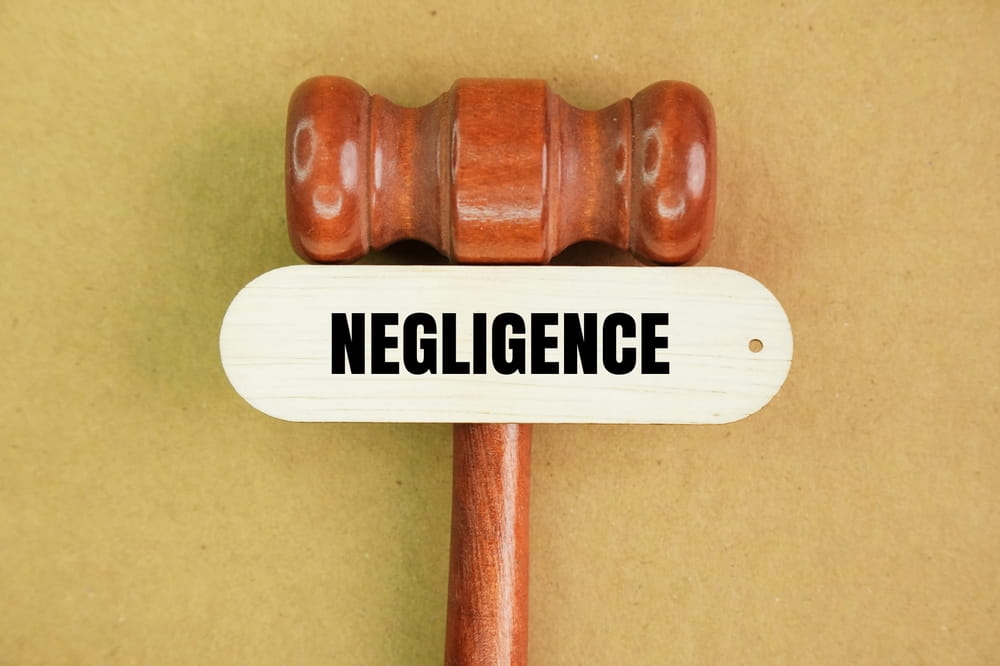 Legal concept of negligence in a grocery store slip-and-fall injury claim