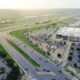 Aerial view of a highway interchange near commercial development in the Pflugerville area