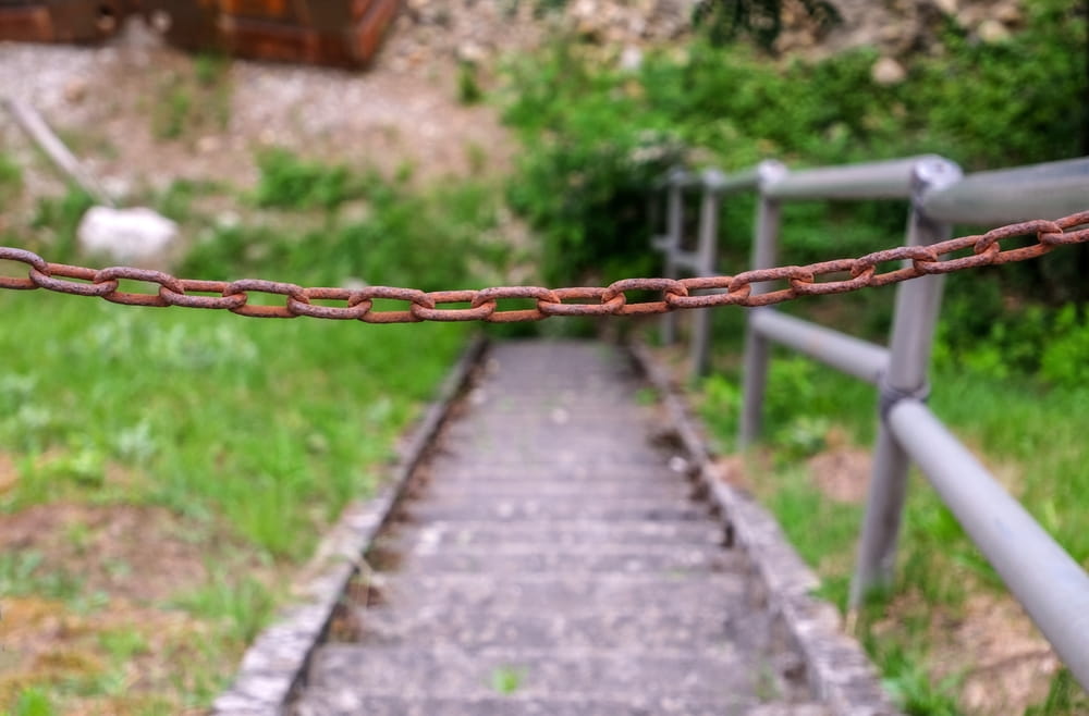 Blocked stairway illustrating restricted access and visitor status issues in premises liability claims