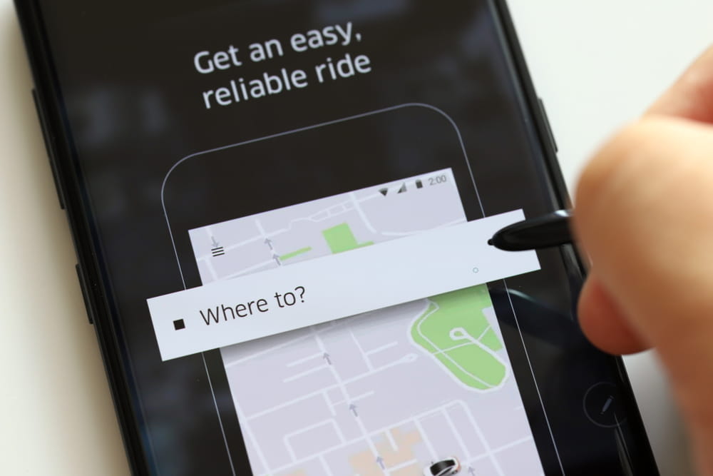 Rideshare app screen prompting a user to request a ride