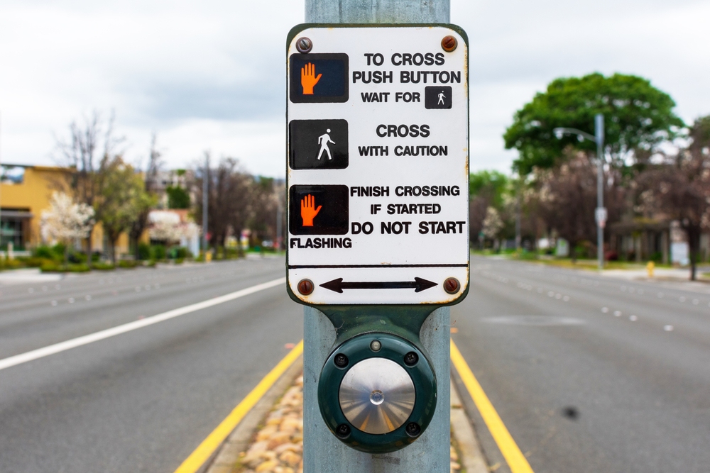 austin-pedestrian-accident-video-evidence Pedestrian crosswalk and walk signal in Austin, where right-of-way rules shape pedestrian accident claims