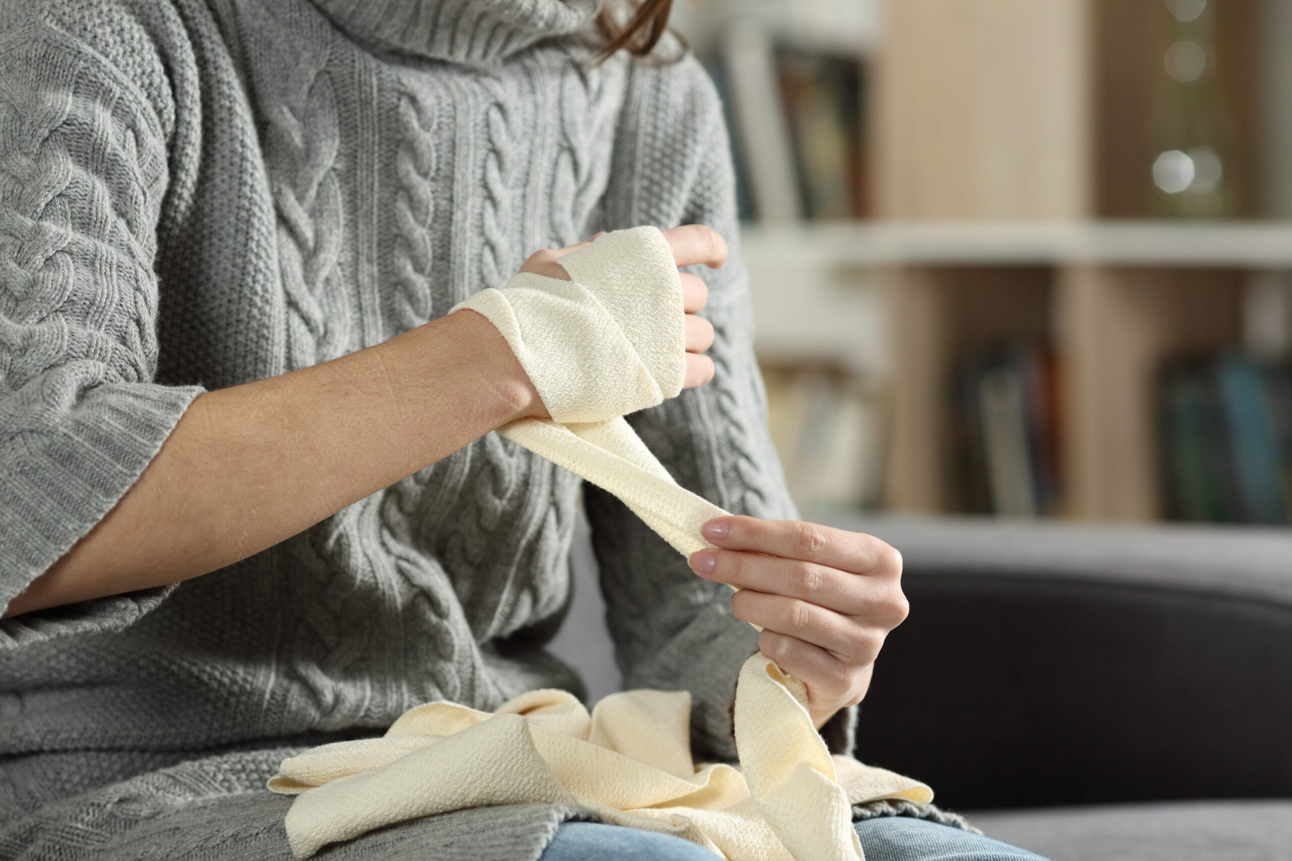 patient with bandaged arm doctor consultation